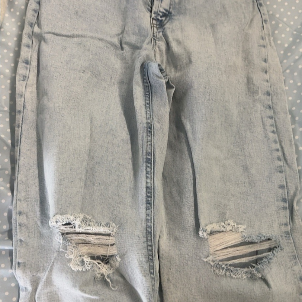 Women's Distressed Light Blue Jeans
